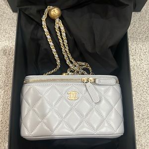 Chanel vanity with chain gold ball